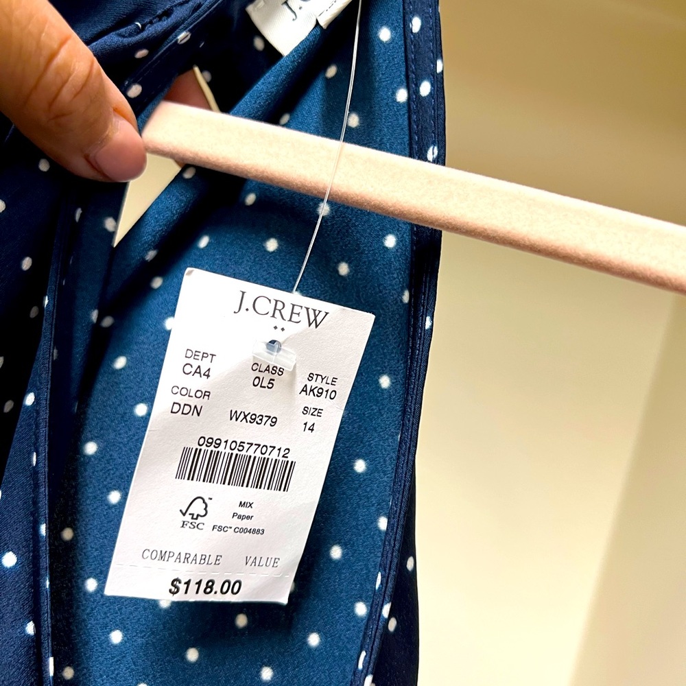 Navy and white polka dot jumpsuit, with halter neck. Size 14.